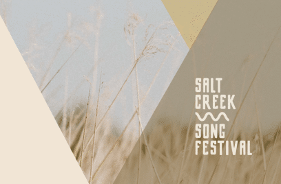 Triangles of tan colors overlaid on an image of prairie grass with the text: Salt Creek Song Festival